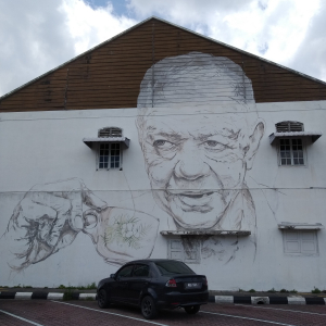 An Old Uncle Drinking Coffee by Ernest Zacharevic